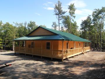 cabin with wrap around porch